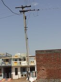 Pole tilted towards my house due to heavy storm and wire was loose power fluctuation regularly